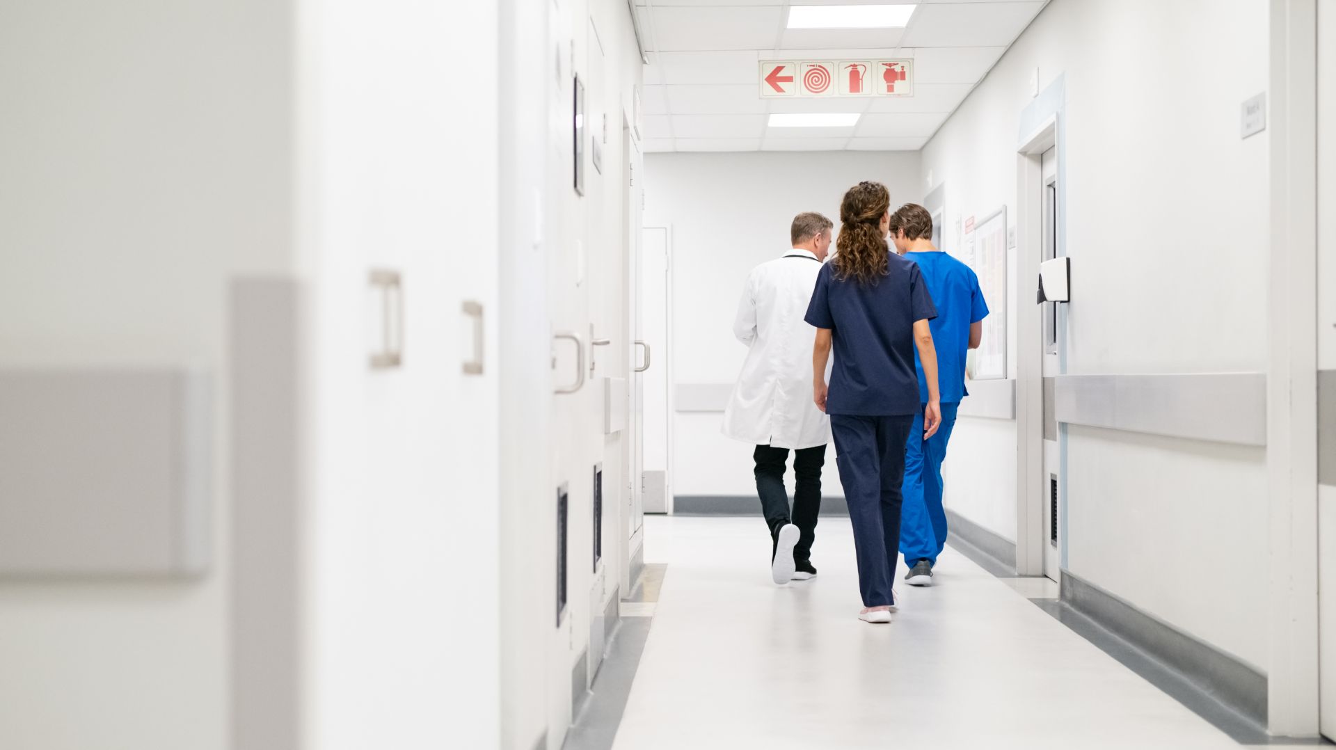 Doctors walking down a hallway