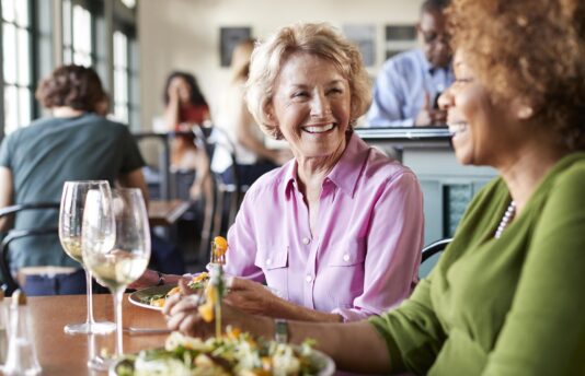 Senior women enjoying their dining experience